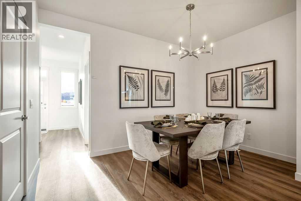 275 Creekside Manor SW, Calgary, Alberta  T2X 4B9 - Photo 6 - A2340032