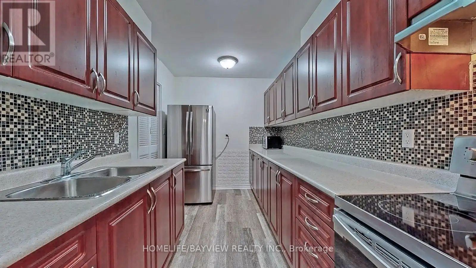1803 - 1 Massey Square, Toronto, Ontario  M4C 5L4 - Photo 2 - E13725826