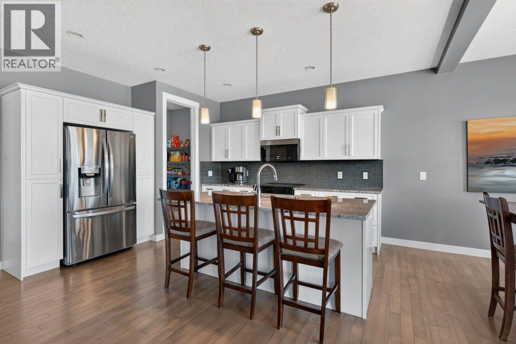 277 Jumping Pound Terrace, Cochrane, Alberta  T4C 0K4 - Photo 7 - A2340277