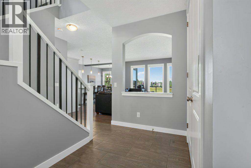 277 Jumping Pound Terrace, Cochrane, Alberta  T4C 0K4 - Photo 4 - A2340277