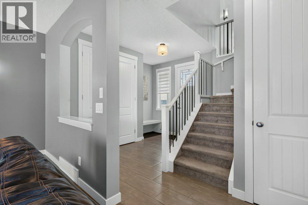 277 Jumping Pound Terrace, Cochrane, Alberta  T4C 0K4 - Photo 3 - A2340277