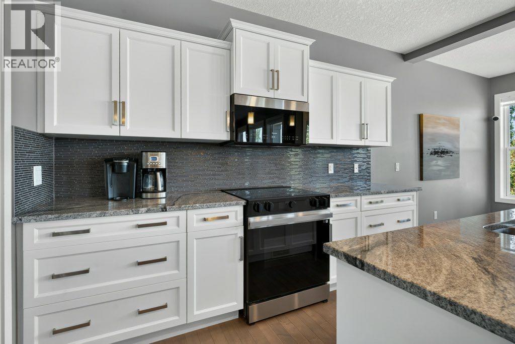 277 Jumping Pound Terrace, Cochrane, Alberta  T4C 0K4 - Photo 10 - A2340277