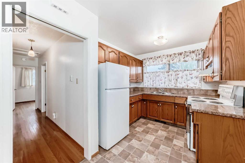 1106 Ninga Road Nw, Calgary, Alberta T2K 2P1 - Photo 7 - A2317242