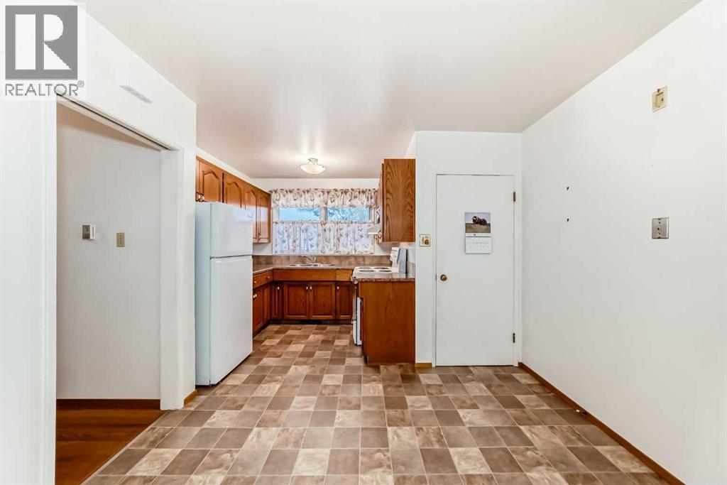 1106 Ninga Road Nw, Calgary, Alberta T2K 2P1 - Photo 6 - A2317242