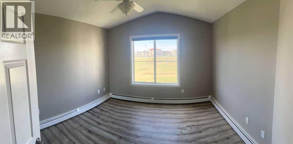 403, 305 1 Avenue Nw, Airdrie, Alberta  T4B 2M5 - Photo 11 - A2314581