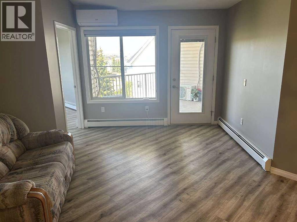 403, 305 1 Avenue Nw, Airdrie, Alberta  T4B 2M5 - Photo 3 - A2314581