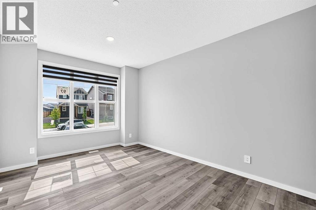 97 Herron Mews Ne, Calgary, Alberta  T3P 1Y7 - Photo 4 - A2338211