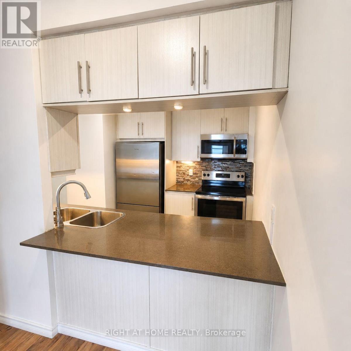 403 - 65 Oneida Crescent, Richmond Hill, Ontario L4B 0G9 - Photo 5 - N13726268