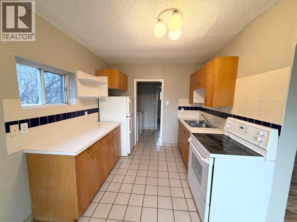 9516 102 Avenue, Grande Prairie, Alberta  T8V 0Z6 - Photo 3 - A2310747