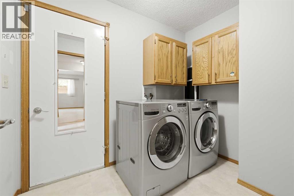 141 Woodbrook Road SW, Calgary, Alberta  T2W 6C6 - Photo 37 - A2339653
