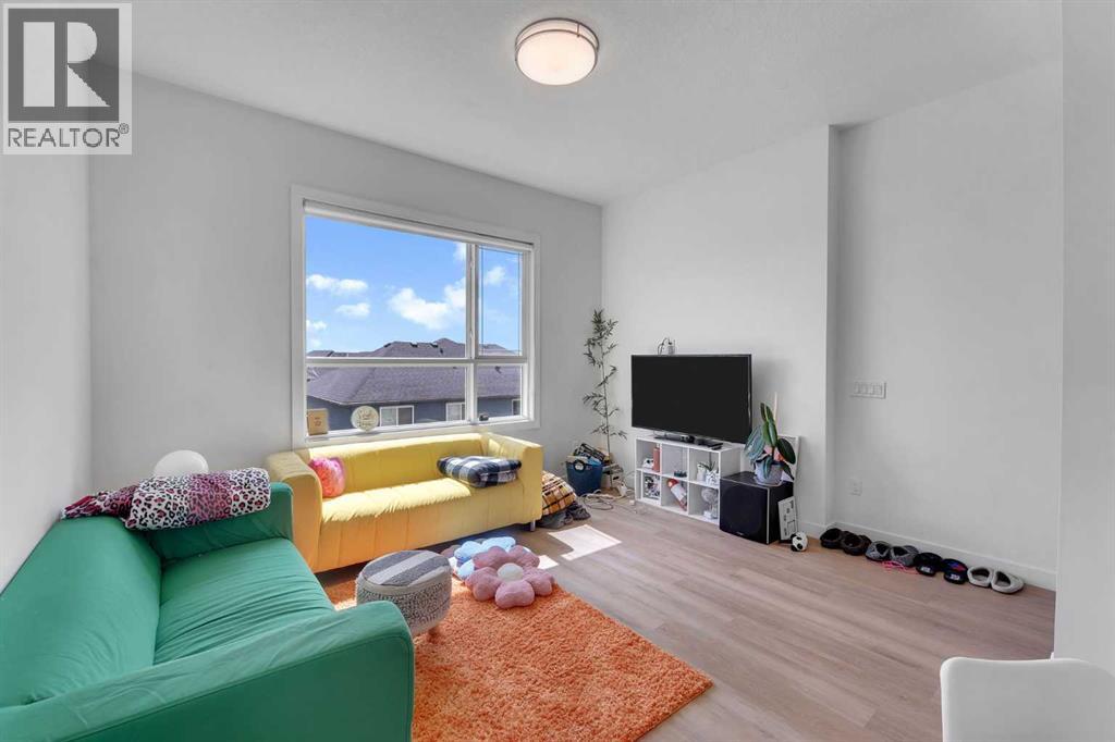 406, 101 Panatella Square Nw, Calgary, Alberta  T3K 2R9 - Photo 4 - A2319099