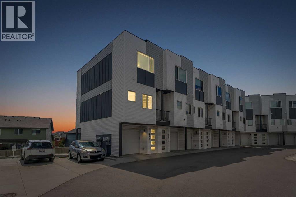 406, 101 Panatella Square Nw, Calgary, Alberta  T3K 2R9 - Photo 1 - A2319099
