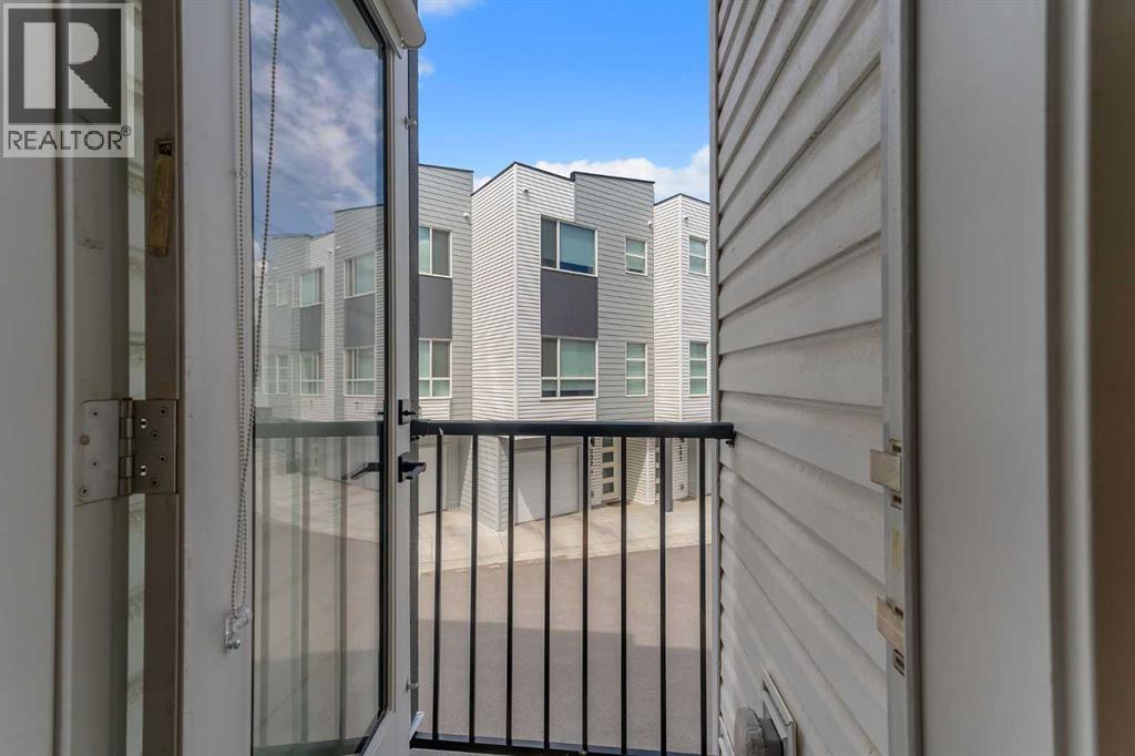 406, 101 Panatella Square Nw, Calgary, Alberta  T3K 2R9 - Photo 12 - A2319099