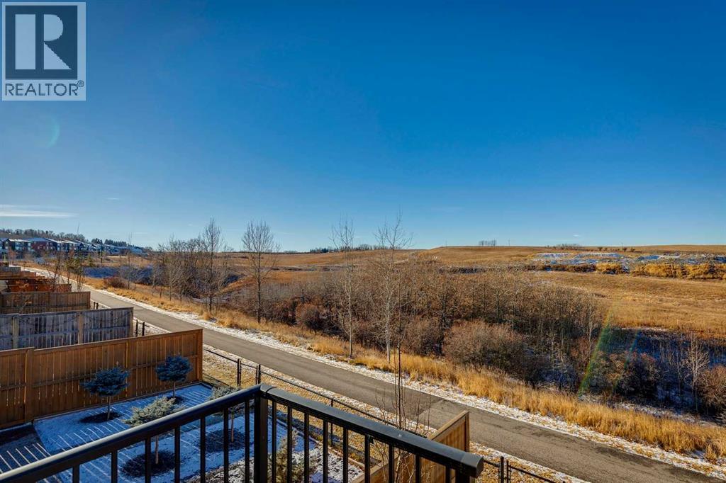 57 Crestridge Bay Sw, Calgary, Alberta  T3B 6H2 - Photo 2 - A2326409