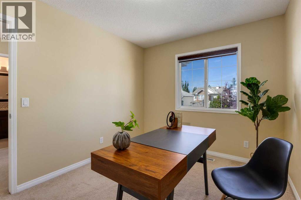 38 Spring Crescent Sw, Calgary, Alberta  T3H 3V2 - Photo 30 - A2341197