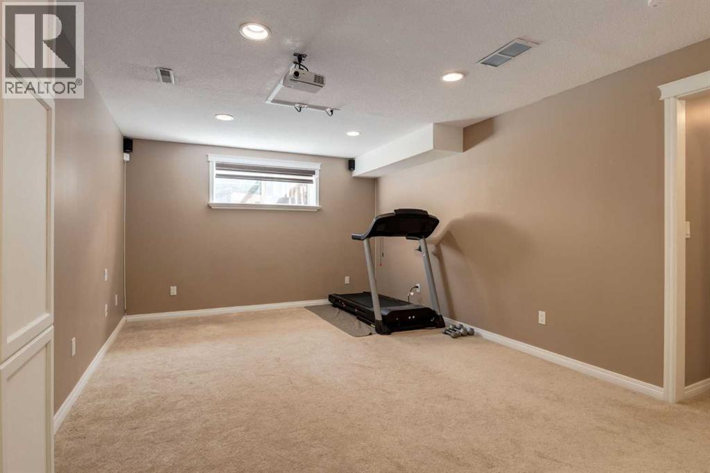 38 Spring Crescent Sw, Calgary, Alberta  T3H 3V2 - Photo 35 - A2341197