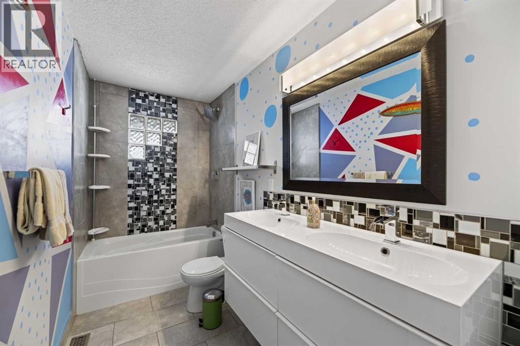 8035 Huntwick Crescent Ne, Calgary, Alberta  T2K 4H7 - Photo 15 - A2338472