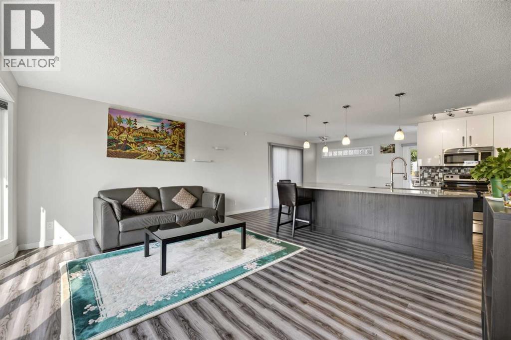 8035 Huntwick Crescent Ne, Calgary, Alberta  T2K 4H7 - Photo 4 - A2338472