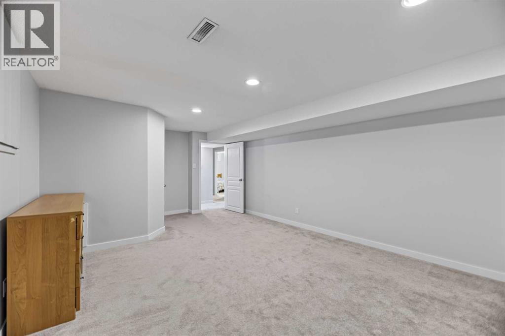 8035 Huntwick Crescent Ne, Calgary, Alberta  T2K 4H7 - Photo 19 - A2338472