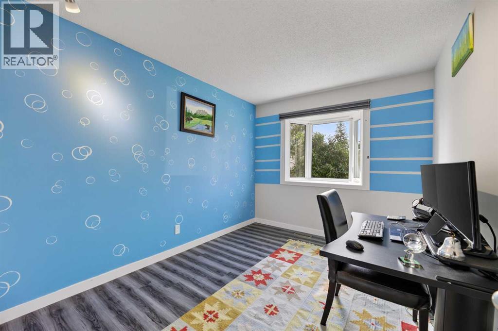 8035 Huntwick Crescent Ne, Calgary, Alberta  T2K 4H7 - Photo 13 - A2338472