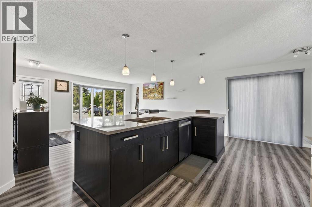 8035 Huntwick Crescent Ne, Calgary, Alberta  T2K 4H7 - Photo 10 - A2338472