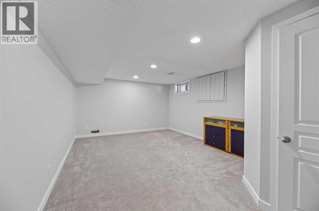 8035 Huntwick Crescent Ne, Calgary, Alberta  T2K 4H7 - Photo 20 - A2338472