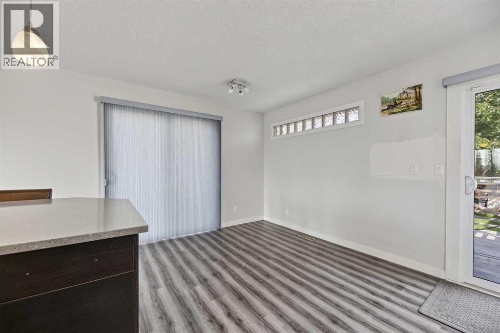 8035 Huntwick Crescent Ne, Calgary, Alberta  T2K 4H7 - Photo 11 - A2338472