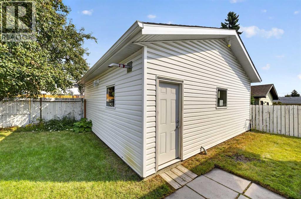 8035 Huntwick Crescent Ne, Calgary, Alberta  T2K 4H7 - Photo 28 - A2338472