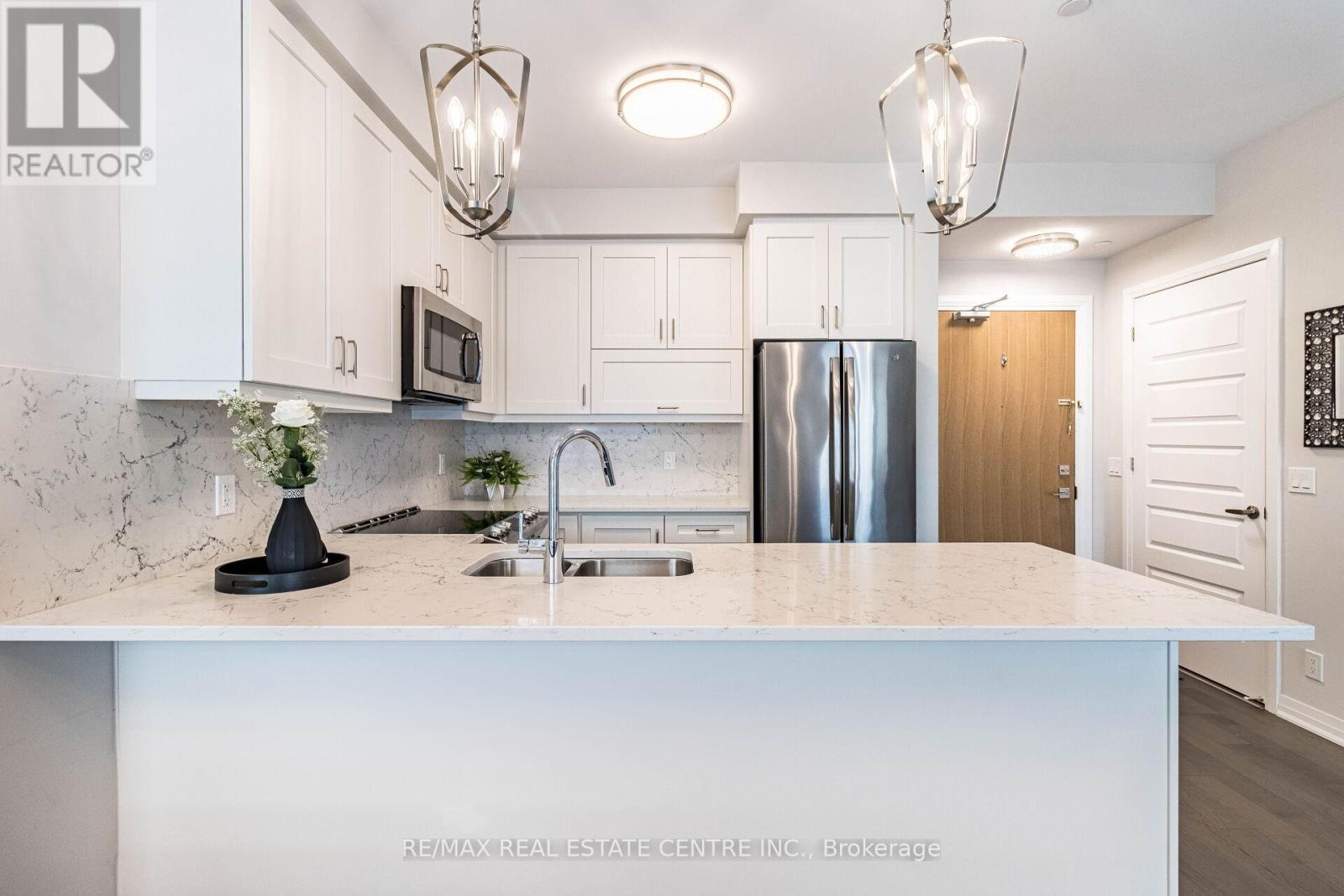 330 - 128 Grovewood Common, Oakville, Ontario  L6H 0X3 - Photo 9 - W13729762