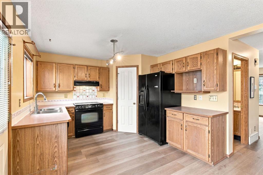 219 Coral Springs Circle Ne, Calgary, Alberta  T3J 3P7 - Photo 4 - A2341352