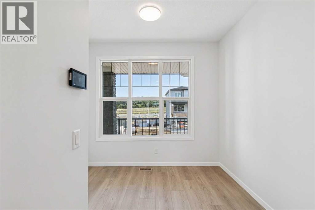 98 Creekview Avenue Sw, Calgary, Alberta  T2X 6M7 - Photo 4 - A2341700
