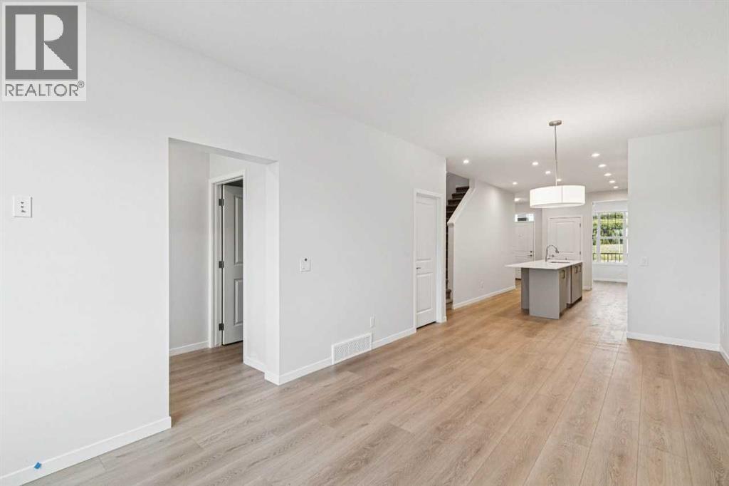 98 Creekview Avenue Sw, Calgary, Alberta  T2X 6M7 - Photo 9 - A2341700