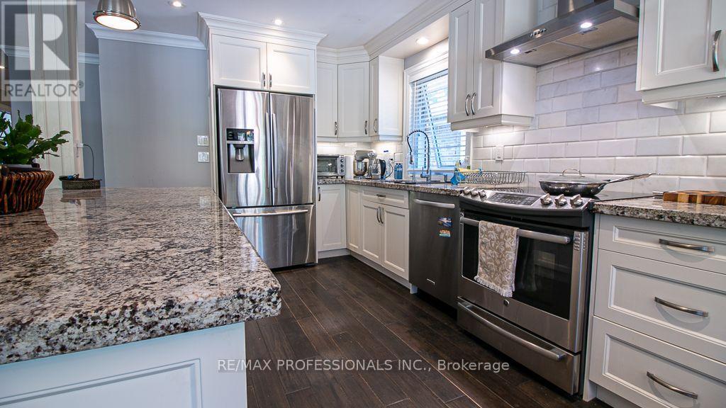 Main - 7 Sedgebrook Crescent, Toronto, Ontario  M9B 2X2 - Photo 10 - W13733318