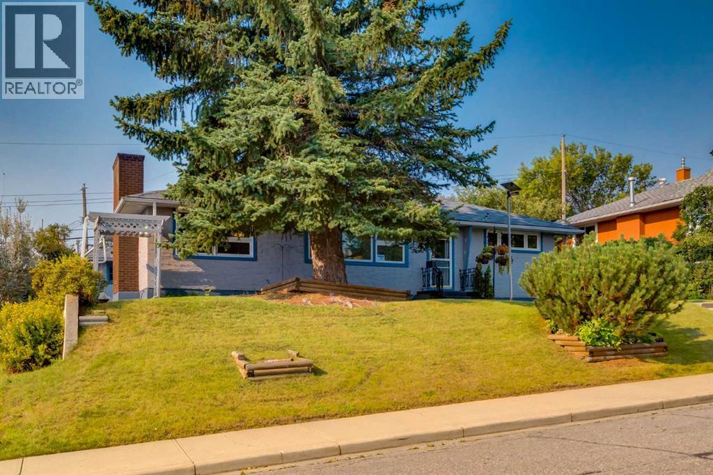 723 Trafford Drive Nw, Calgary, Alberta  T2K 2T5 - Photo 2 - A2338504