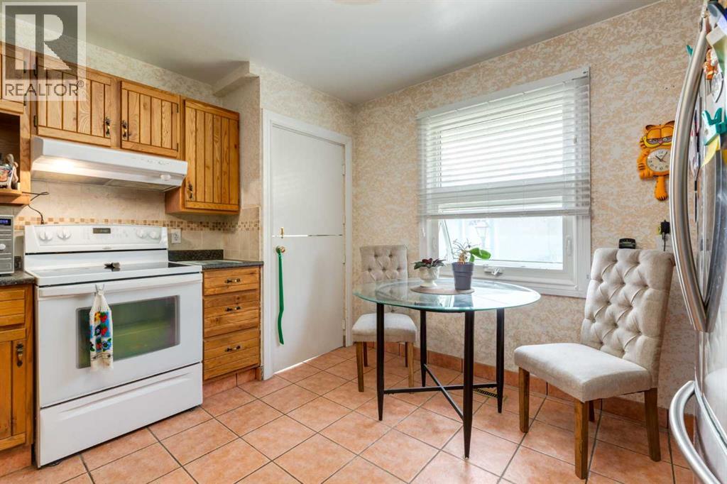 723 Trafford Drive Nw, Calgary, Alberta  T2K 2T5 - Photo 15 - A2338504