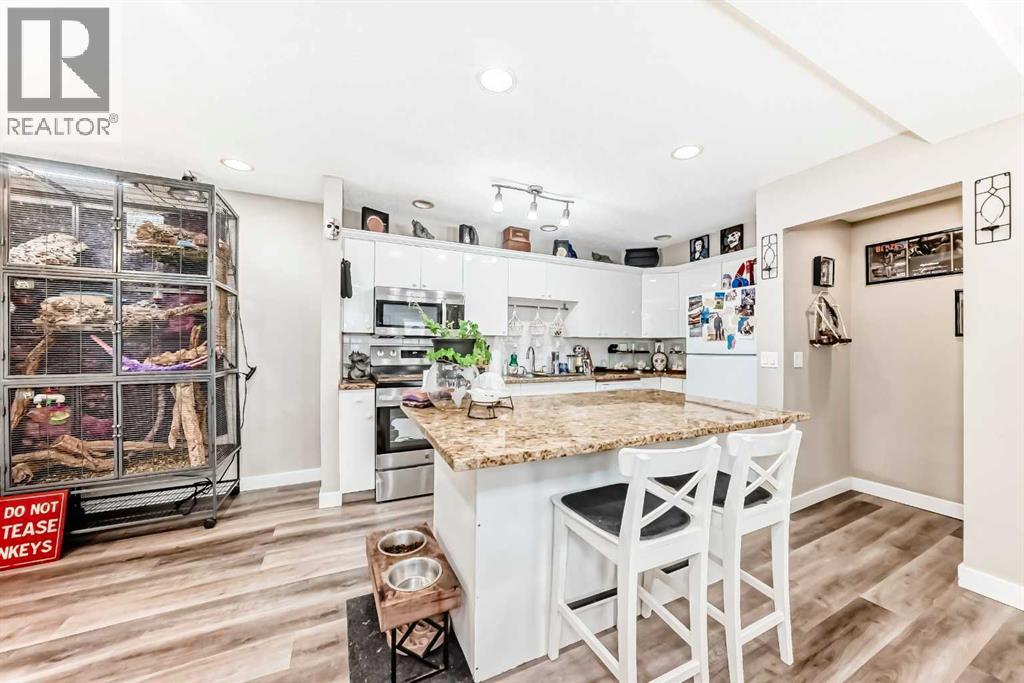 1-6, 8 Huntley Close Ne, Calgary, Alberta  T2K 4Z3 - Photo 5 - A2311334