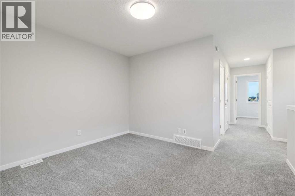 58 Creekview Avenue, Calgary, Alberta  T2X 6M7 - Photo 11 - A2341803