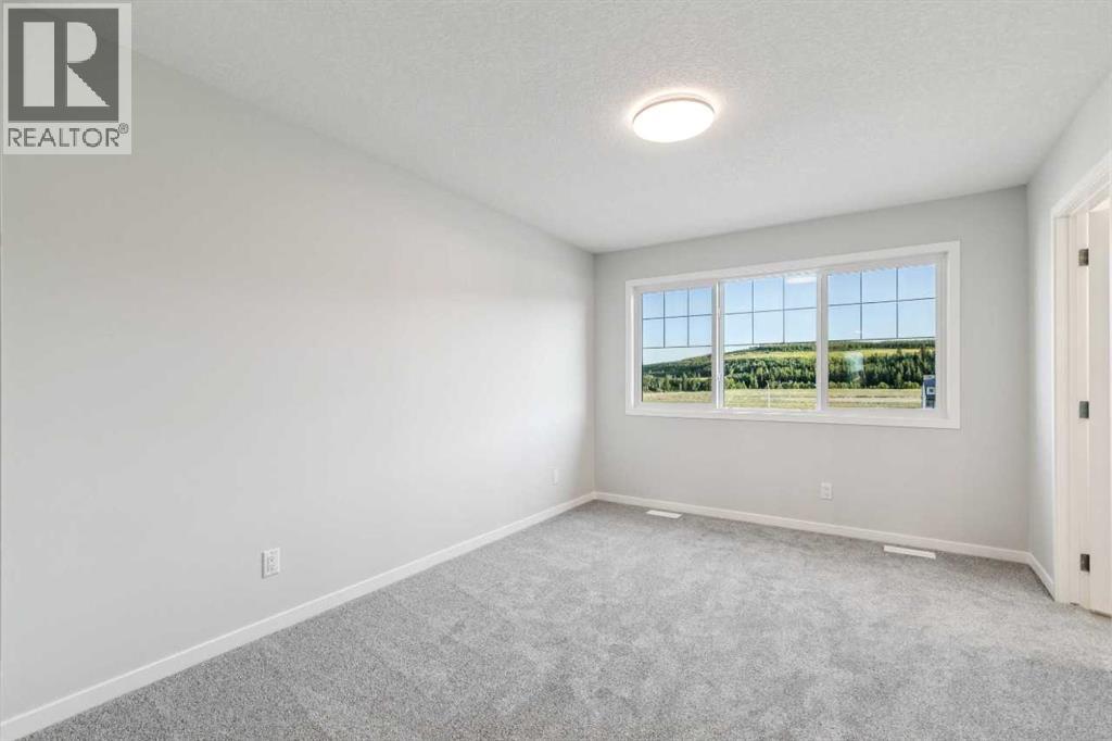 58 Creekview Avenue, Calgary, Alberta  T2X 6M7 - Photo 12 - A2341803