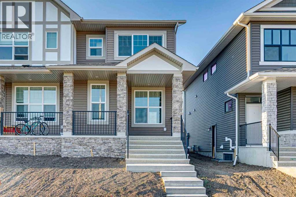 58 Creekview Avenue, Calgary, Alberta  T2X 6M7 - Photo 2 - A2341803