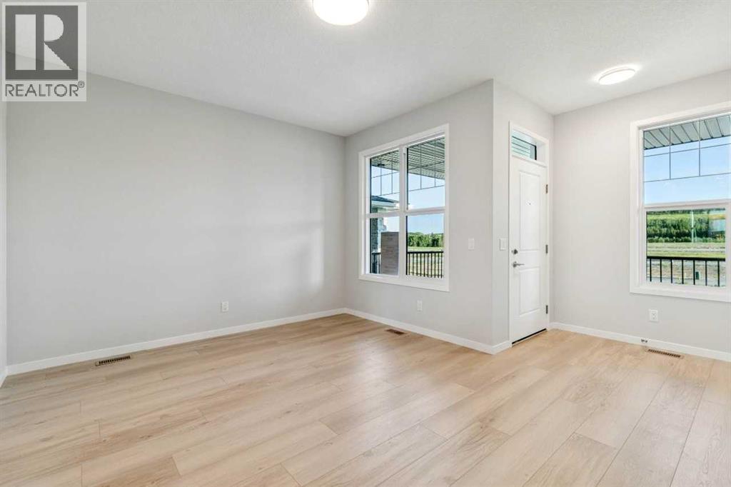 58 Creekview Avenue, Calgary, Alberta  T2X 6M7 - Photo 3 - A2341803