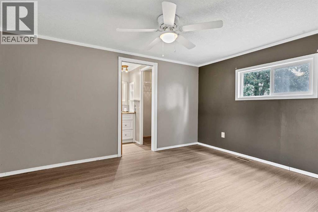 197 Spring Dale Circle Se, Airdrie, Alberta  T4A 1N9 - Photo 11 - A2340181