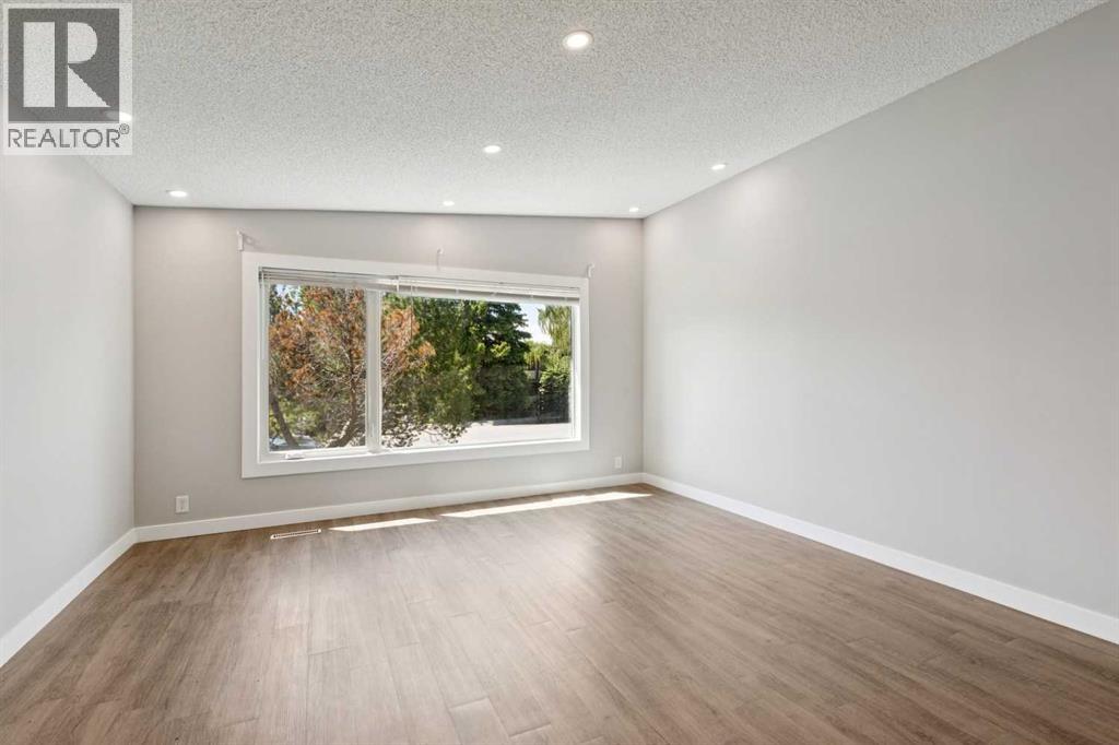 702 Kingsmere Crescent Sw, Calgary, Alberta  T2V 2H7 - Photo 3 - A2340065