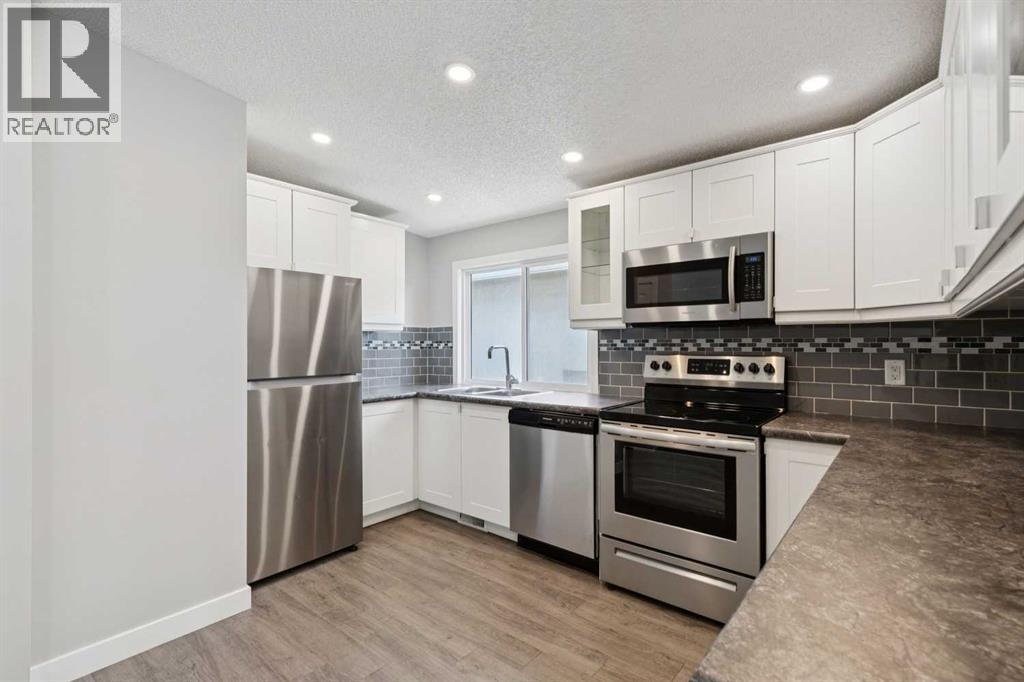 702 Kingsmere Crescent Sw, Calgary, Alberta  T2V 2H7 - Photo 9 - A2340065