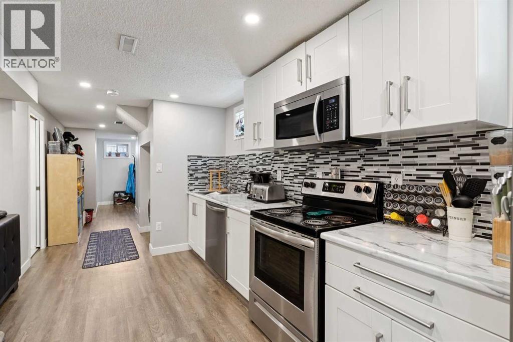 702 Kingsmere Crescent Sw, Calgary, Alberta  T2V 2H7 - Photo 24 - A2340065