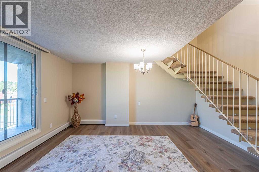 513, 4944 Dalton Drive NW, Calgary, Alberta T3A 2E6 - Photo 4 - A2341907