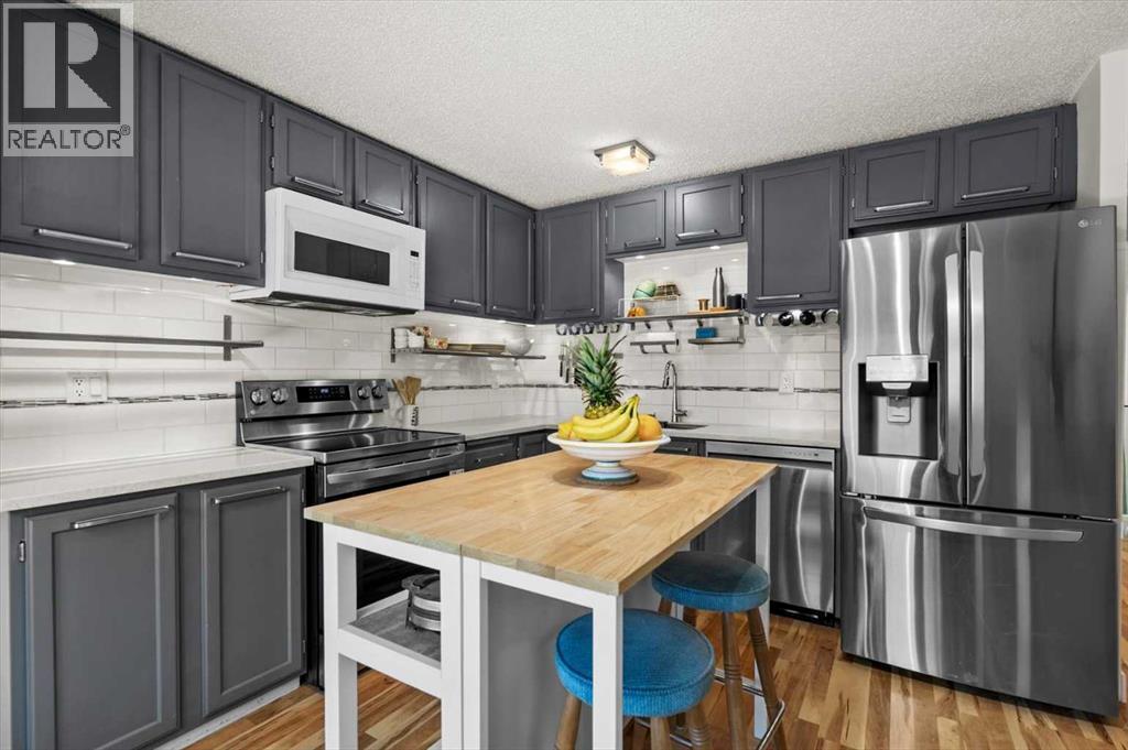 208 Queenston Heights Se, Calgary, Alberta  T2J 6L1 - Photo 11 - A2340581