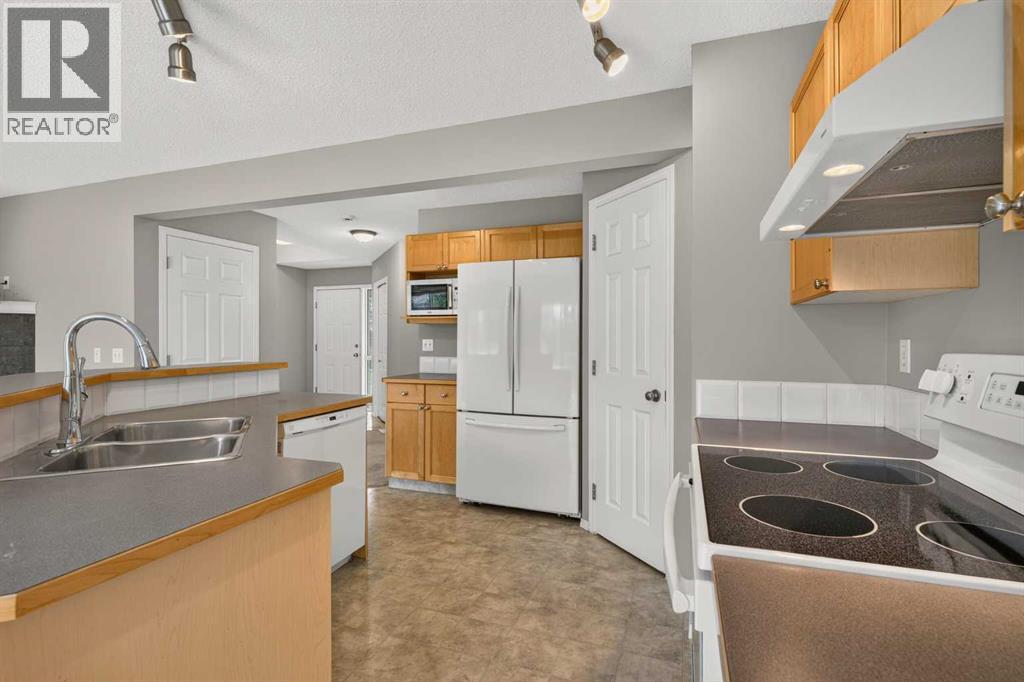 170 Tusslewood Drive NW, Calgary, Alberta  T3L 2N1 - Photo 7 - A2340971