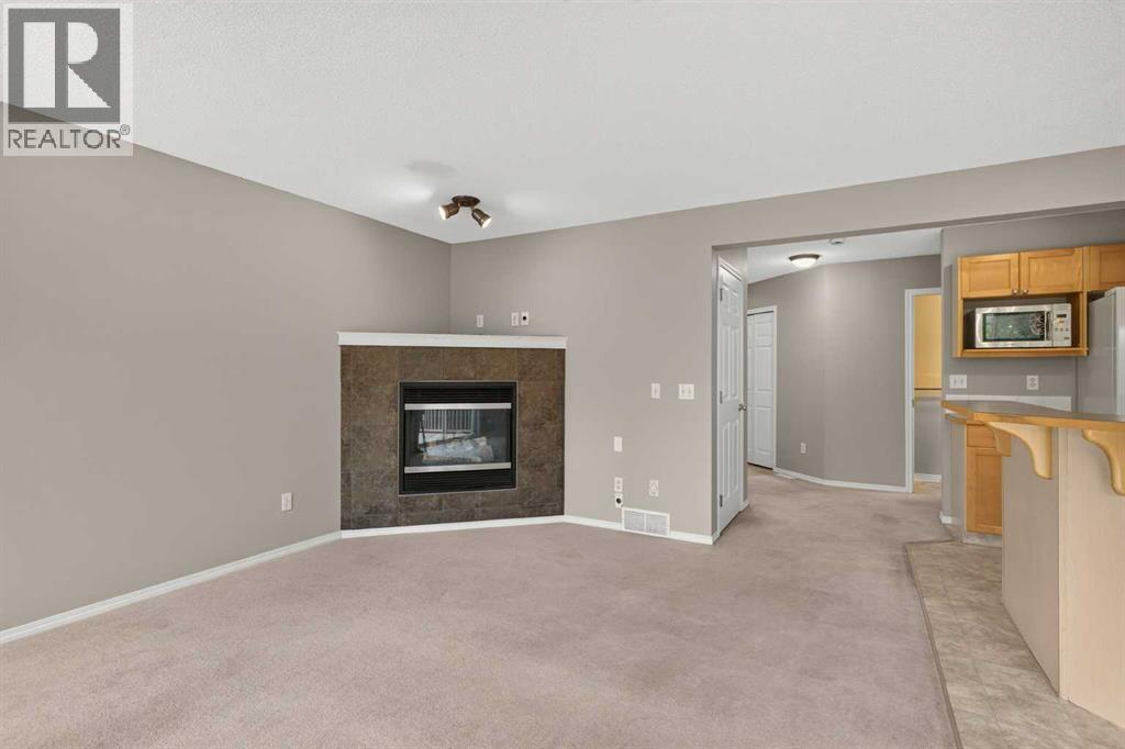 170 Tusslewood Drive NW, Calgary, Alberta  T3L 2N1 - Photo 4 - A2340971
