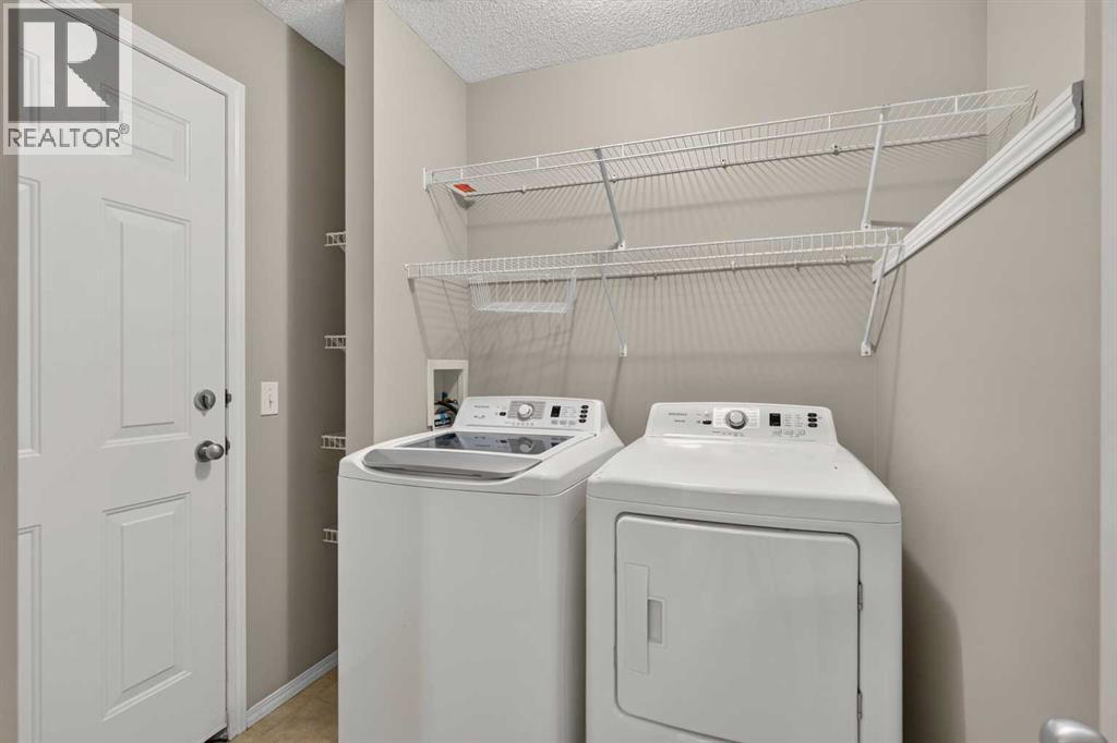 170 Tusslewood Drive NW, Calgary, Alberta  T3L 2N1 - Photo 11 - A2340971