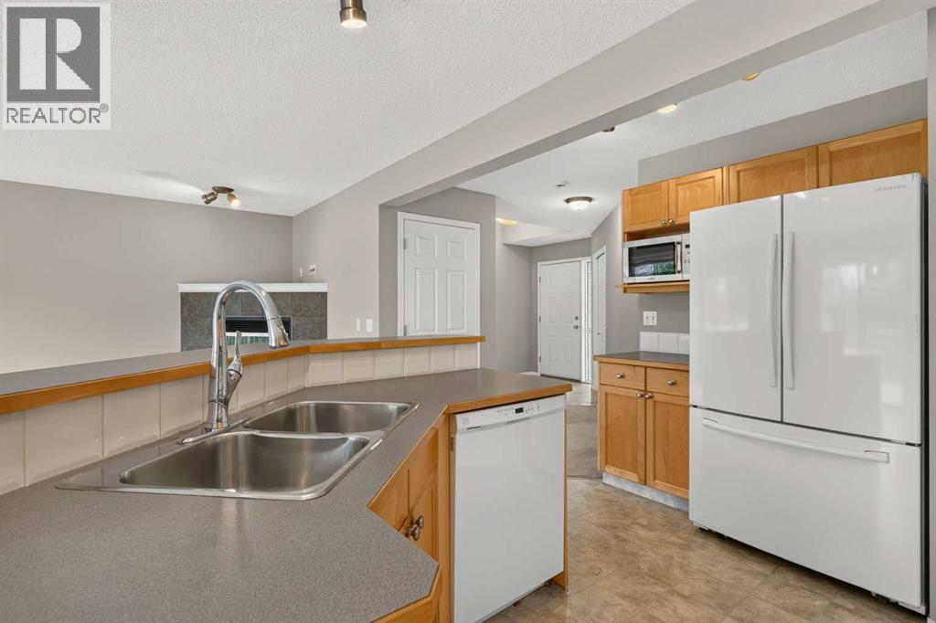 170 Tusslewood Drive NW, Calgary, Alberta  T3L 2N1 - Photo 8 - A2340971